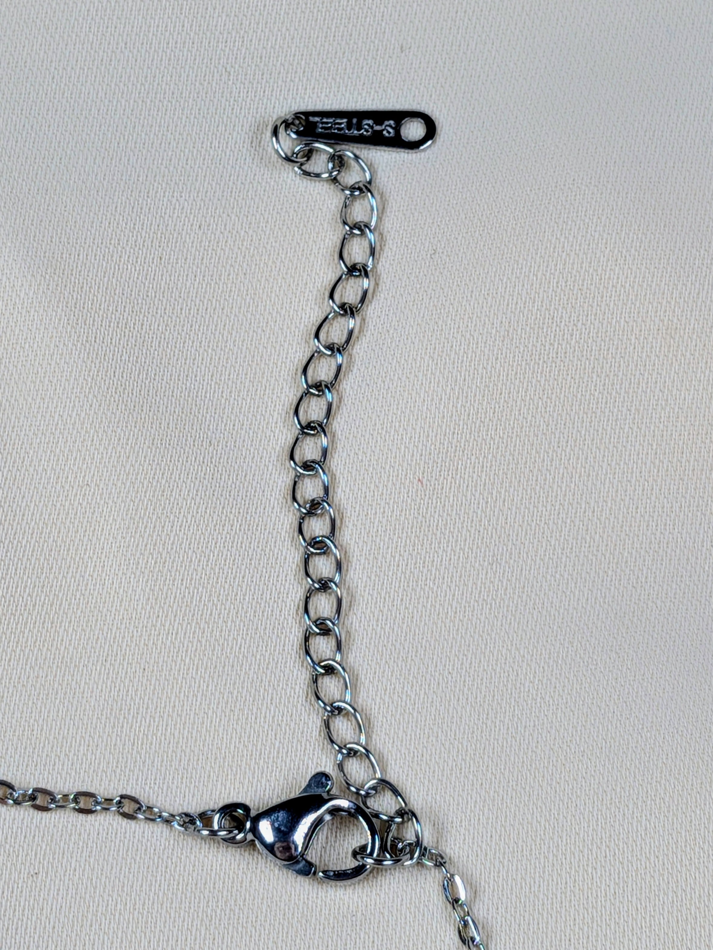 Collier Pendentif Fleur Tournante en Acier inoxydable