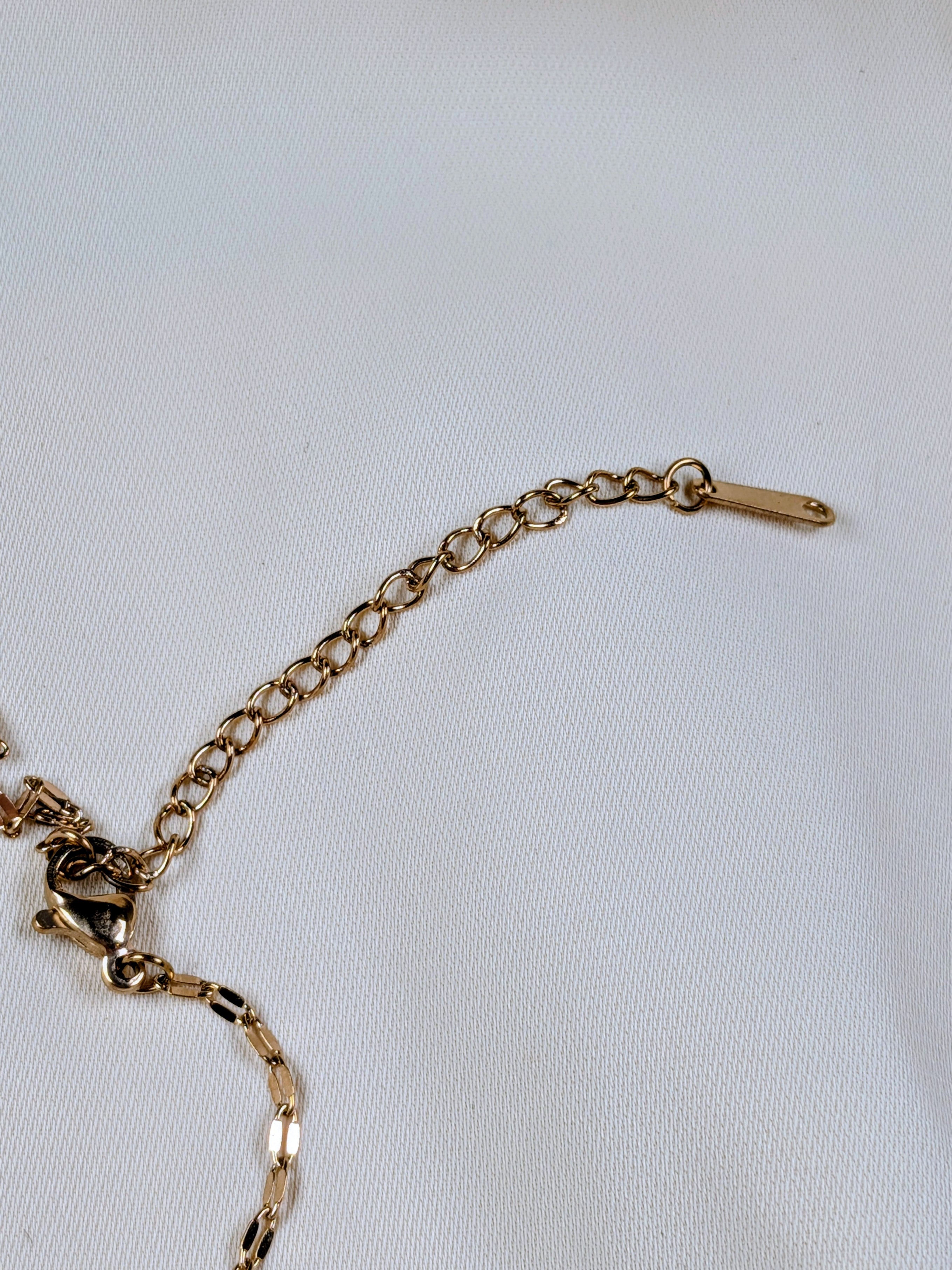 Collier Pendentif Fleur Tournante en Acier inoxydable