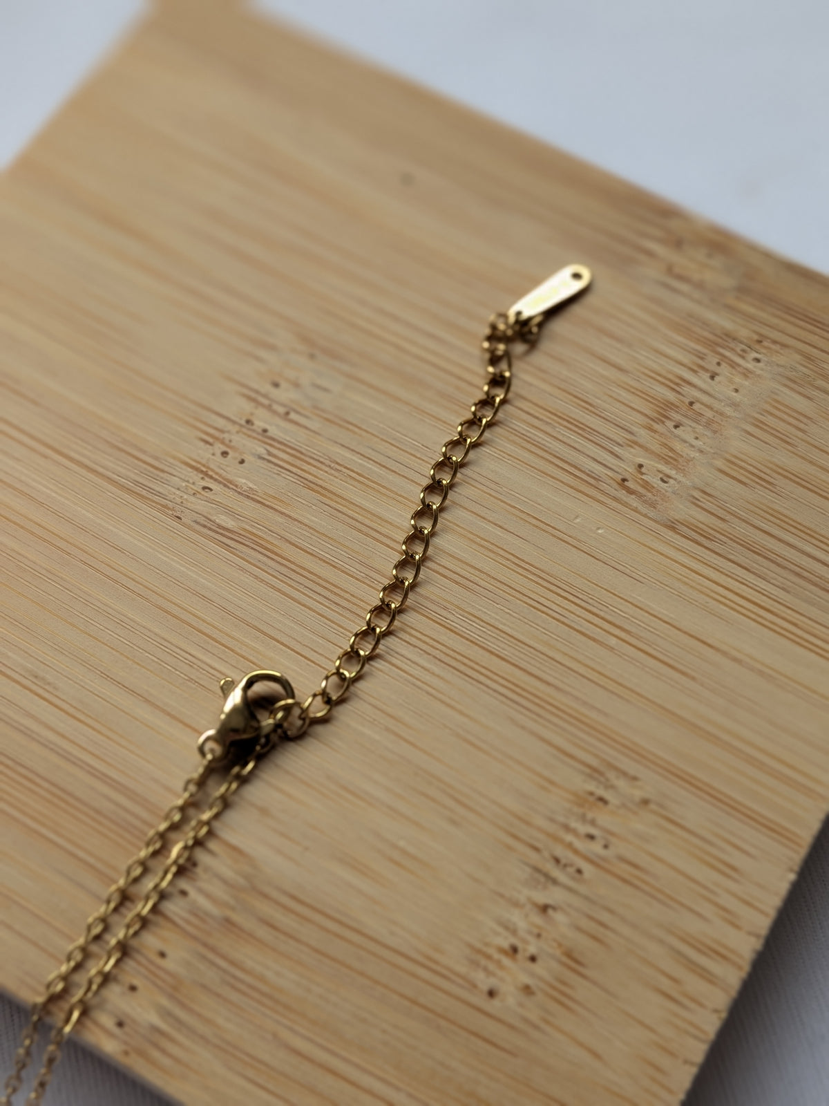 Collier Tournant Fleur — Doré & Strass blanc