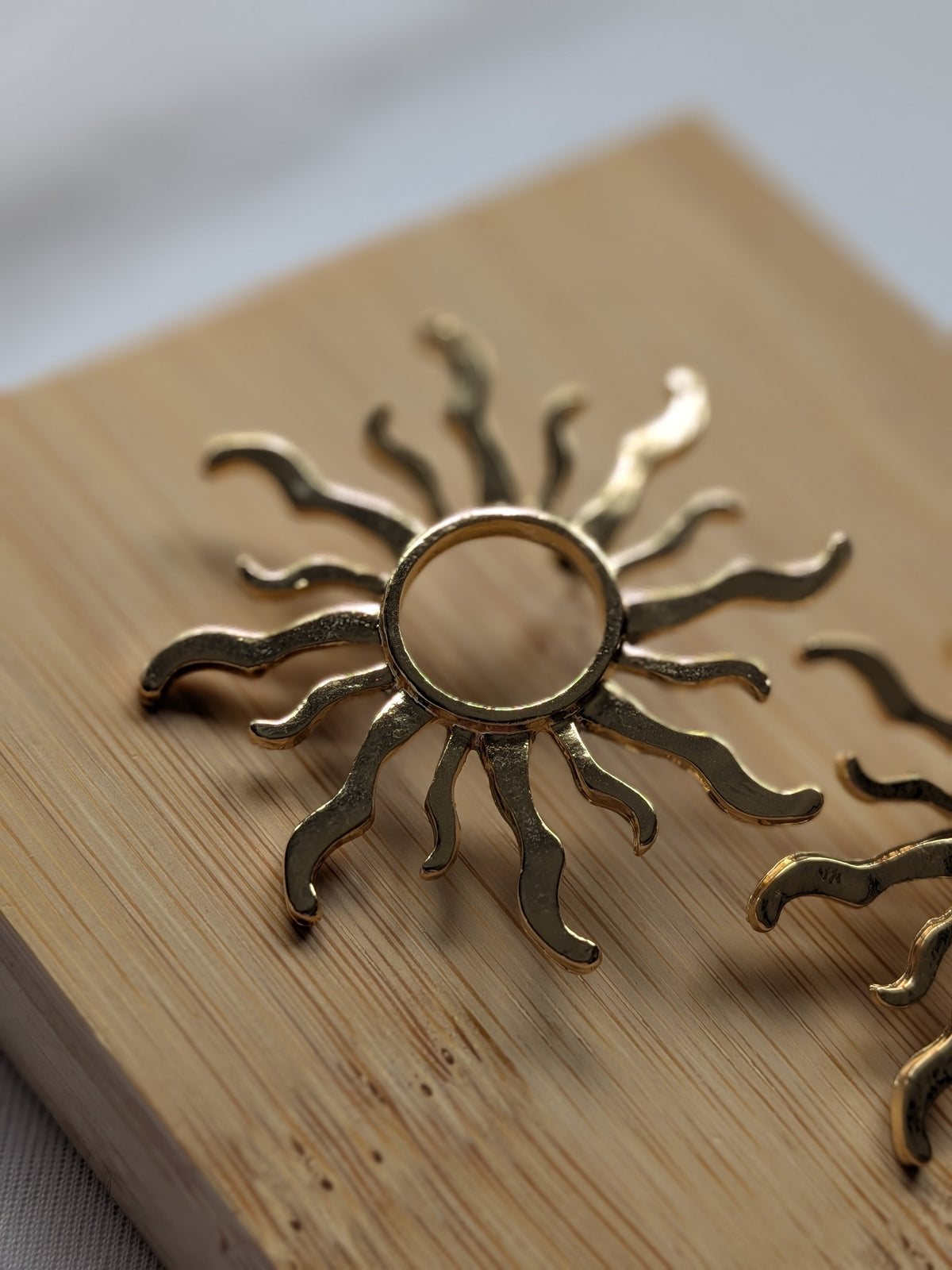 Boucle d'oreille soleil - Acier inoxydable