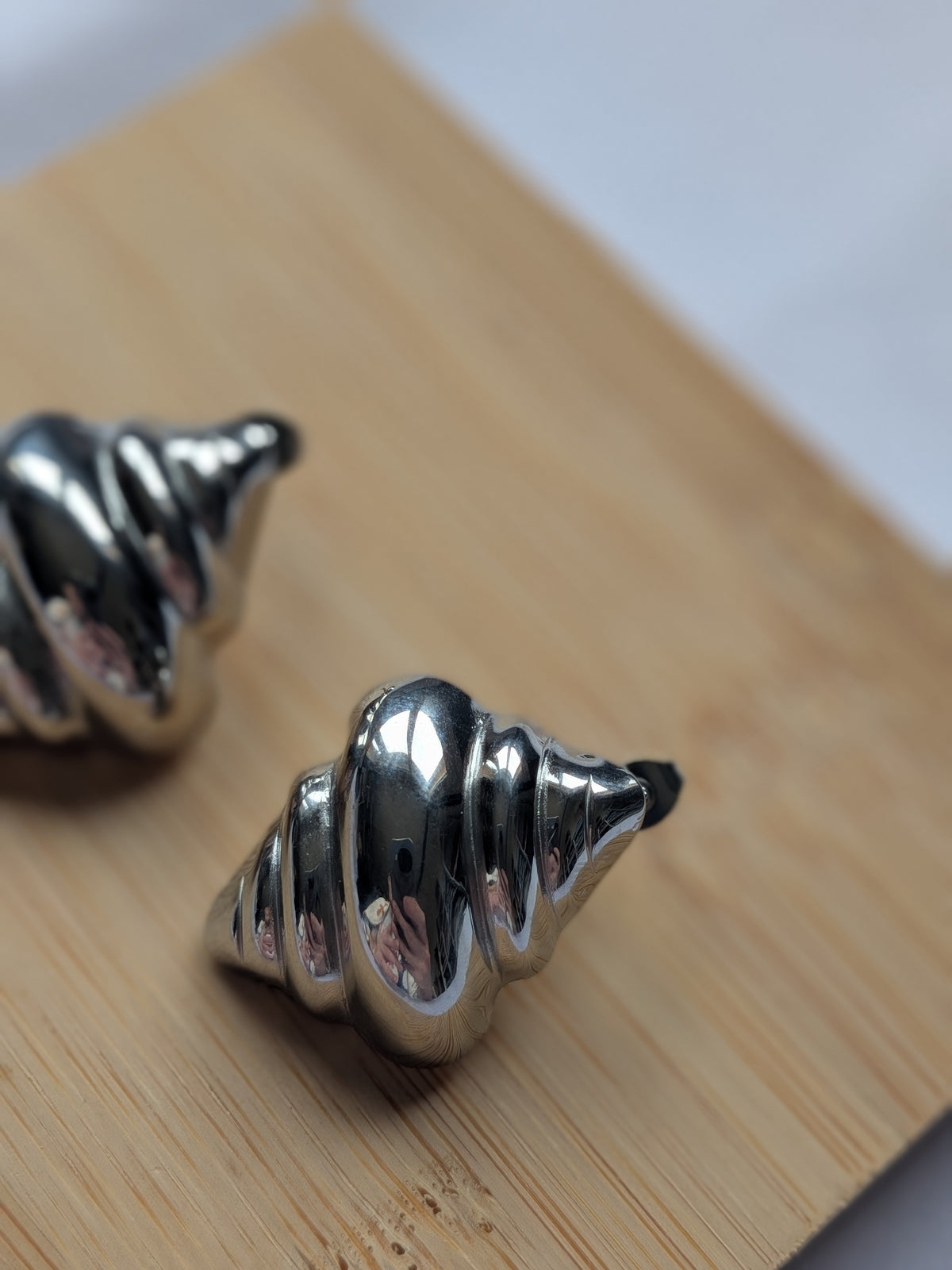 Boucle d'oreille coquillage argentée acier inoxydable