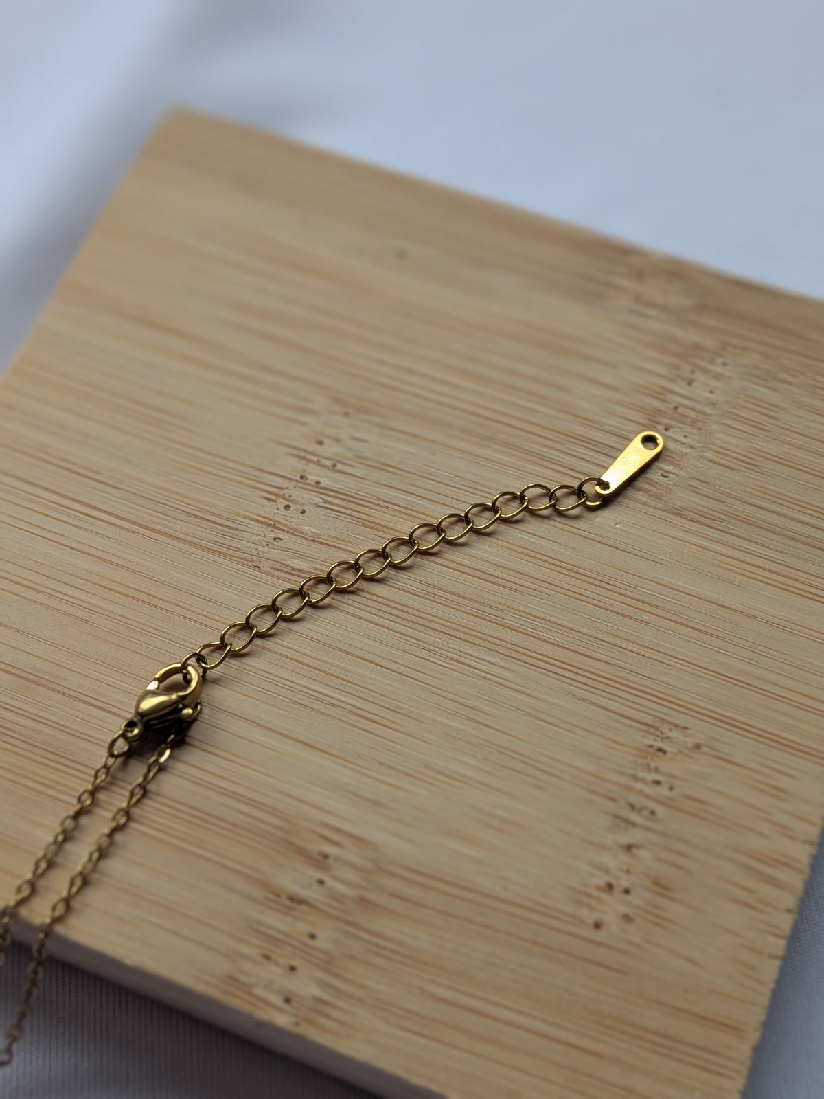 Collier Pendentif Trèfle à Double Face – Élégance