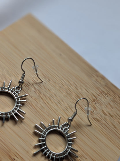 Boucle d'oreille soleile argentée